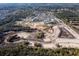 Aerial view of a community under construction with ponds and roads at 1718 Cultivation Lane St # 536, Mount Pleasant, SC 29466
