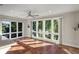 Spacious common area with large windows and terracotta tile floors at 3635 Pompano Ct, Seabrook Island, SC 29455