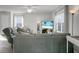 Comfortable living room offering gray sofas and a large TV at 370 Spruce Ivy St, Moncks Corner, SC 29461