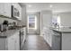 Modern kitchen with stainless steel appliances and an island at 370 Spruce Ivy St, Moncks Corner, SC 29461