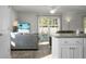 Open living area with hardwood floors and access to the kitchen at 370 Spruce Ivy St, Moncks Corner, SC 29461