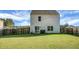 Large backyard with a view of the home's back at 370 Spruce Ivy St, Moncks Corner, SC 29461