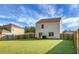 Large backyard with a view of the home's back at 370 Spruce Ivy St, Moncks Corner, SC 29461
