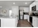 Modern kitchen with stainless steel appliances and white cabinets at 370 Spruce Ivy St, Moncks Corner, SC 29461