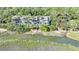 Aerial view of waterfront townhouses with private decks overlooking a tranquil waterway at 1209 Creekwatch Trace, Seabrook Island, SC 29455