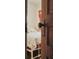 Antique door with original hardware; view into bedroom beyond at 8057 Point Of Pines Rd, Edisto Island, SC 29438