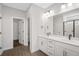 Elegant bathroom with double vanity, large mirror, and walk-in shower at 175 Cantona Dr, Summerville, SC 29483