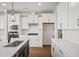 Modern kitchen with white cabinets, quartz countertops, and stainless steel appliances at 175 Cantona Dr, Summerville, SC 29483