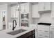 Modern kitchen with white cabinets, quartz countertops, and stainless steel appliances at 175 Cantona Dr, Summerville, SC 29483