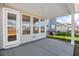 Covered patio with access door and view of homes at 175 Cantona Dr, Summerville, SC 29483