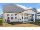 House back view, covered patio, fenced yard at 175 Cantona Dr, Summerville, SC 29483