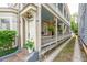 Two-story home with a spacious front porch and lovely landscaping at 175 Wentworth St # A, Charleston, SC 29401