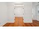 Hardwood floors and white walls in this elegant hallway at 175 Wentworth St # A, Charleston, SC 29401