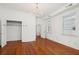 Charming bedroom with hardwood floors and built-in closet at 175 Wentworth St # A, Charleston, SC 29401