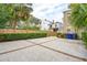Gravel driveway with a view of neighboring homes and a fence at 175 Wentworth St # A, Charleston, SC 29401