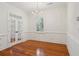 Bright dining room with hardwood floors and window at 175 Wentworth St # A, Charleston, SC 29401