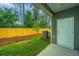 Small backyard with wooden fence and AC unit at 1103 Twin Rivers Drive # 71, Wando, SC 29492