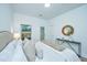Bright bedroom with plush bedding and a view of the backyard at 1103 Twin Rivers Drive # 71, Wando, SC 29492
