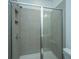 Modern shower with gray tile and glass enclosure at 1103 Twin Rivers Drive # 71, Wando, SC 29492