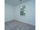 Spacious bedroom with gray carpeting and a window at 1103 Twin Rivers Drive # 71, Wando, SC 29492