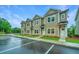 Tan townhouses with ample parking in front at 1103 Twin Rivers Drive # 71, Wando, SC 29492