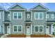 Two-story townhouses with gray siding and white trim at 1103 Twin Rivers Drive # 71, Wando, SC 29492