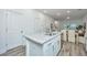 Modern kitchen with white cabinets, granite countertops and stainless steel appliances at 1103 Twin Rivers Drive # 71, Wando, SC 29492