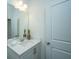 Clean bathroom with a white vanity and a large mirror at 1103 Twin Rivers Drive # 71, Wando, SC 29492