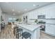 Modern kitchen with white cabinets, granite countertops and stainless steel appliances at 1103 Twin Rivers Drive # 71, Wando, SC 29492