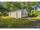 White detached garage with single door and window at 112 A & B Cone Ln, Summerville, SC 29483