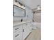 Modern bathroom with white vanity and tile flooring at 4429 Francis Younge Way, Hollywood, SC 29449