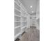 Spacious walk-in closet with ample shelving and natural light at 4429 Francis Younge Way, Hollywood, SC 29449