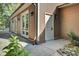 Home exterior showcasing brown siding and a patio at 4429 Francis Younge Way, Hollywood, SC 29449