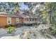 Side view of house with landscaping and a walkway at 4429 Francis Younge Way, Hollywood, SC 29449
