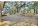 Wooden deck overlooking a wooded backyard at 4429 Francis Younge Way, Hollywood, SC 29449