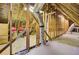 Unfinished attic space with wooden beams and framing at 4429 Francis Younge Way, Hollywood, SC 29449