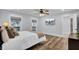 Comfortable bedroom featuring hardwood floors and a view at 4429 Francis Younge Way, Hollywood, SC 29449