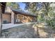 Brown house exterior with a detached barn and AC units at 4429 Francis Younge Way, Hollywood, SC 29449