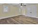 Charming bedroom with hardwood floors and ceiling fan at 4429 Francis Younge Way, Hollywood, SC 29449