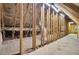 Unfinished attic space with wooden beams and framing at 4429 Francis Younge Way, Hollywood, SC 29449