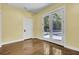Basement room with white doors and polished floors at 4429 Francis Younge Way, Hollywood, SC 29449