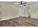 Spacious bedroom with hardwood floors and ceiling fan at 4429 Francis Younge Way, Hollywood, SC 29449