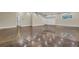 Finished basement with garage door and stairs at 4429 Francis Younge Way, Hollywood, SC 29449