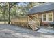Wooden deck with stairs leading to the backyard, offering outdoor space at 4429 Francis Younge Way, Hollywood, SC 29449