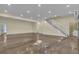 Finished basement with epoxy floors, built-in staircase, and a full bathroom at 4429 Francis Younge Way, Hollywood, SC 29449