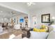 Living area flows into sunroom, bright and airy at 178 Garden Gate Way, Summerville, SC 29486