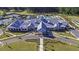 Aerial view of community clubhouse with tennis courts and pool nearby at 178 Garden Gate Way, Summerville, SC 29486