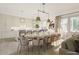Open concept kitchen and dining area with large table at 527 Helmsman St # 527, Daniel Island, SC 29492