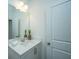 Clean bathroom with white vanity and quartz countertop at 701 Twin Rivers Dr # 41, Wando, SC 29492