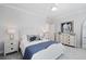 Cozy bedroom with a queen-size bed, nightstands, and a dresser at 3904 Delinger Dr, Mount Pleasant, SC 29466